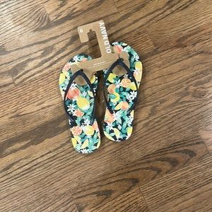 Flip flops! Brand: Old Navy. Size: 6. Color: black, lemons, oranges